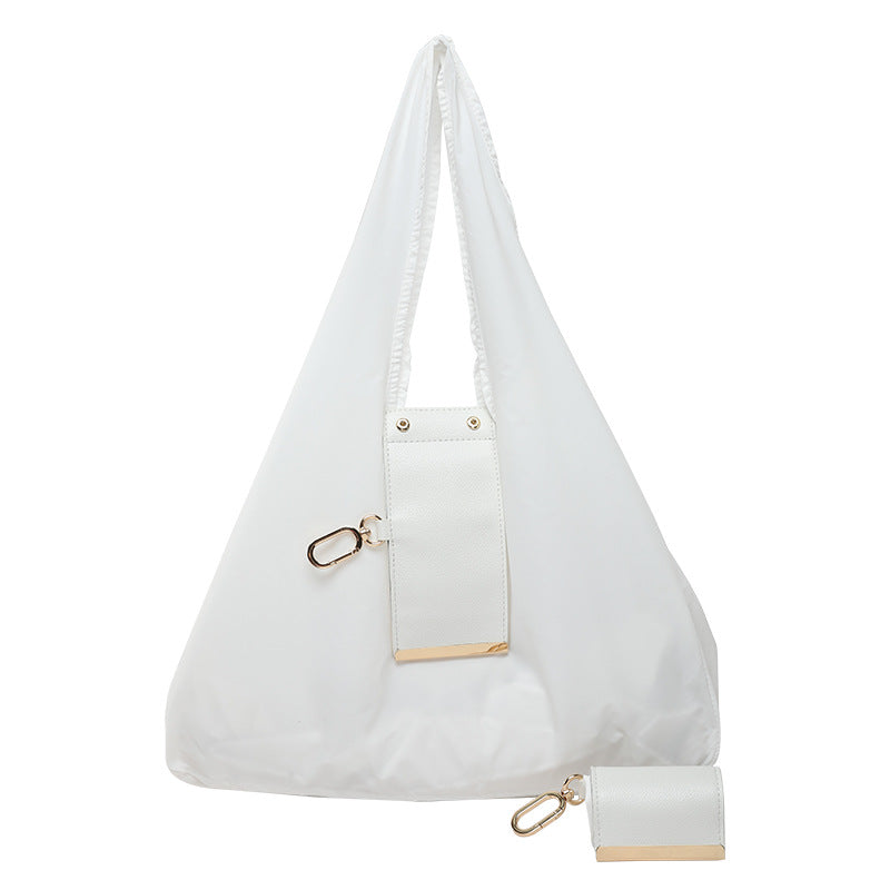 🎁-Tiny as a Keychain, Holds Up to 30 lbs! The Ultimate Everyday Foldaway